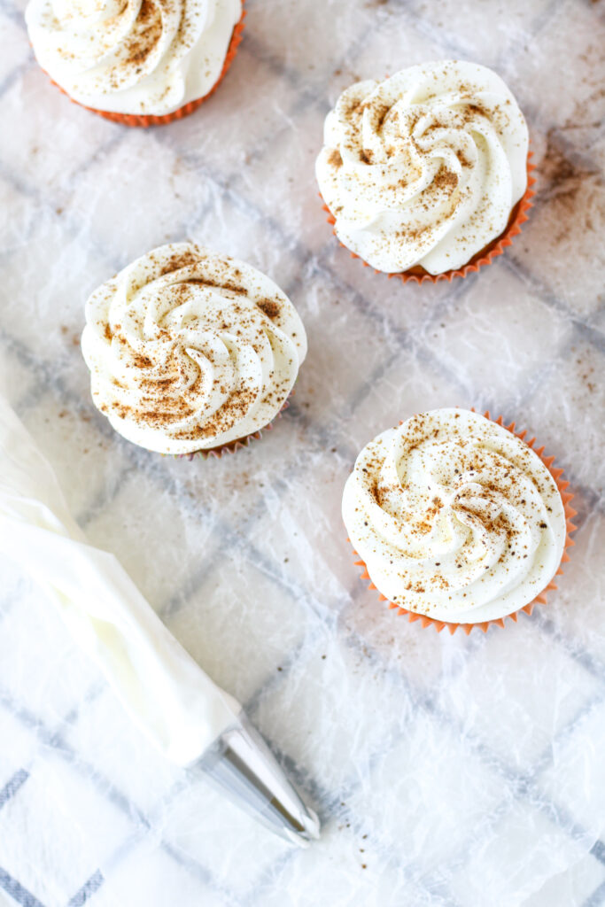 Pumpkin Spice Latte Cupcakes with stabilized whipped cream
