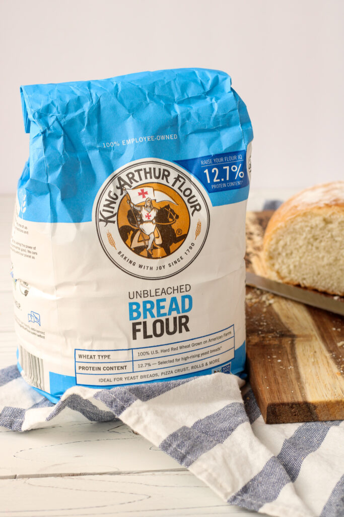 Bread Flour, cutting board and a kitchen towel