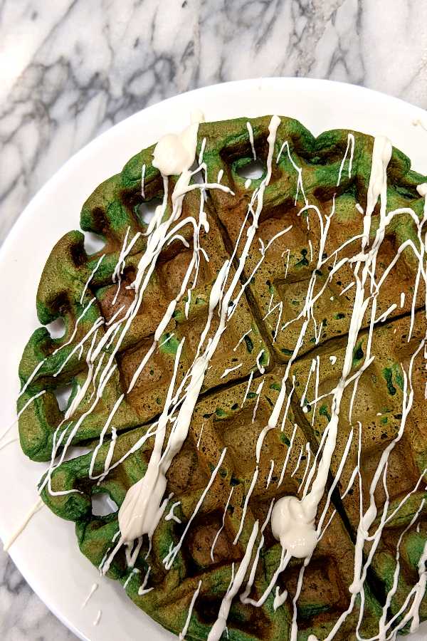 Green Velvet Waffles with white chocolate drizzle
