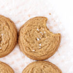 Chocolate Chipless Cookies with a bite taken out of one.