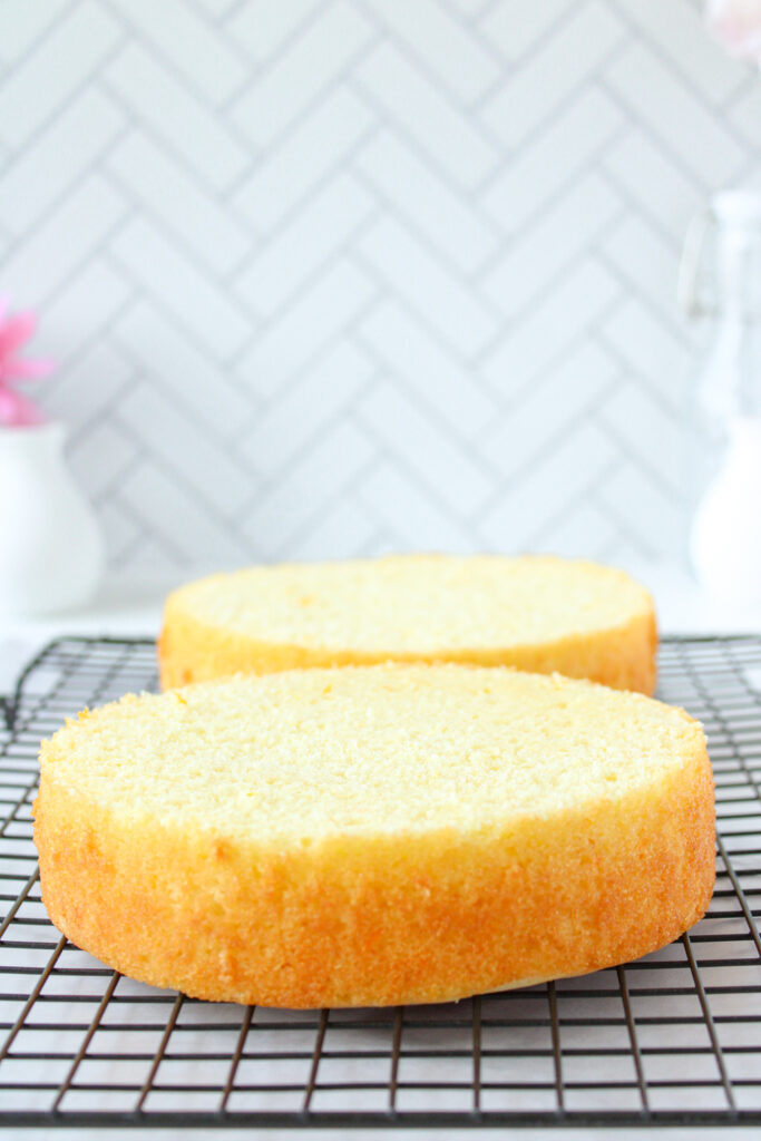 Tequila Orange Cake Layers on a cooling rack