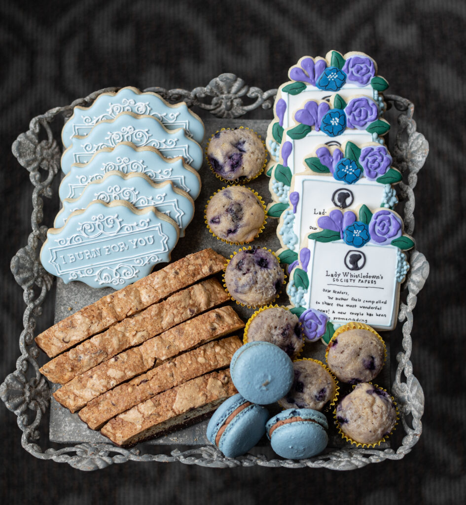tray of cookies, biscotti, muffins, and macarons