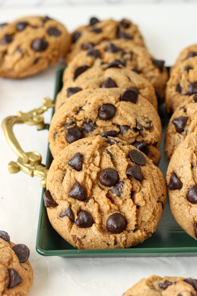 Brown Butter Espresso Chip Cookies on a forest green serving tray