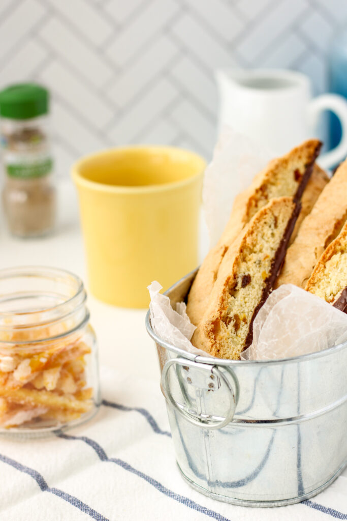 Orange Cardamom Biscotti with tea and candied orange peel