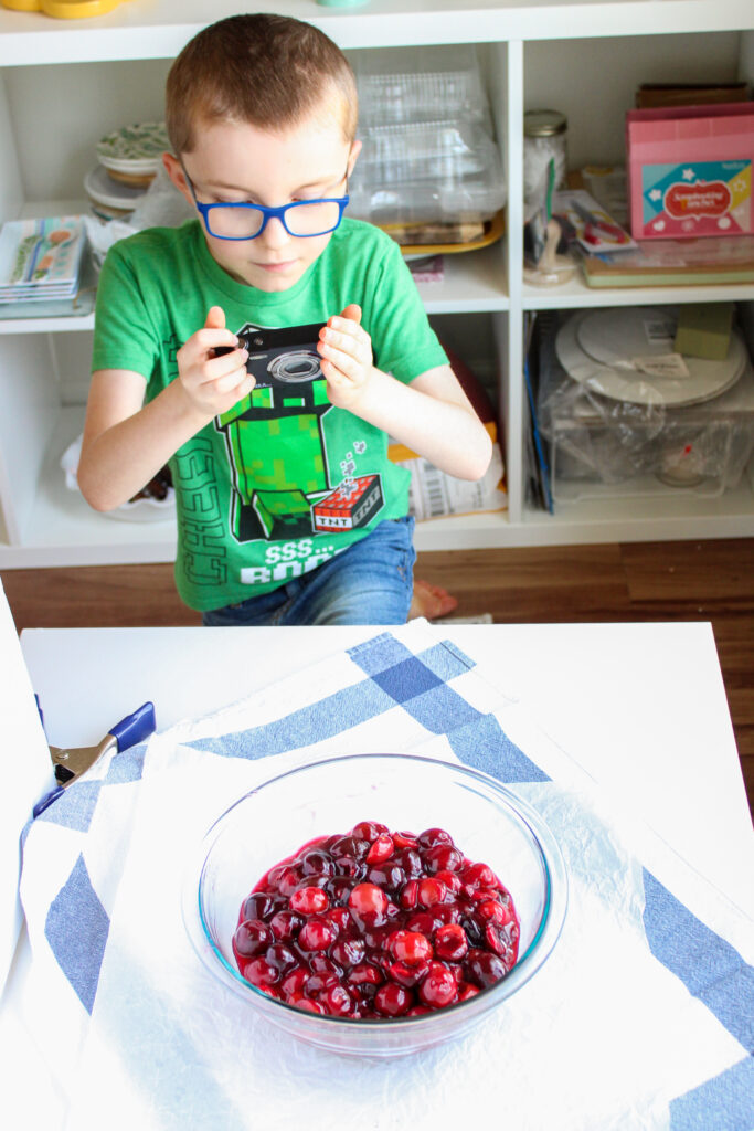 Ben photographing cherry pie filling