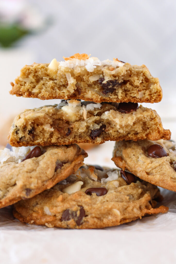 Coconut Chocolate Chip Cookies stacked and broken in half