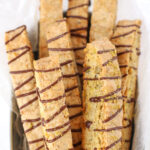 Brown Butter Pistachio Biscotti with a chocolate drizzle