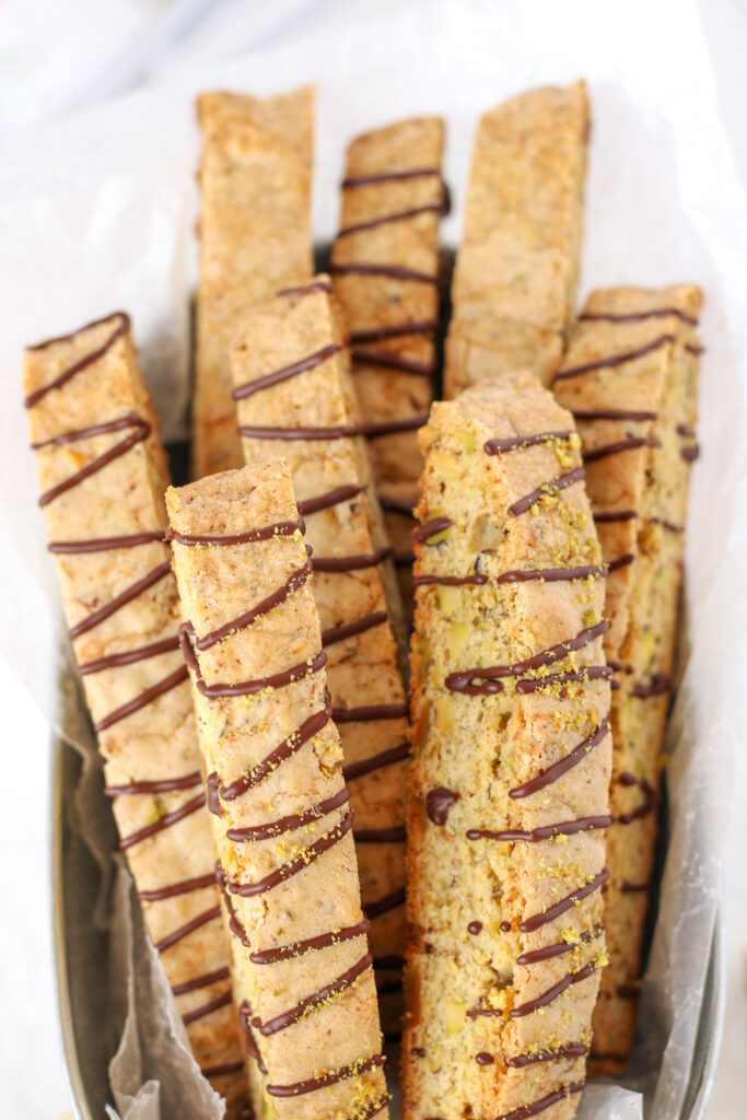 Brown Butter Pistachio Biscotti with a chocolate drizzle