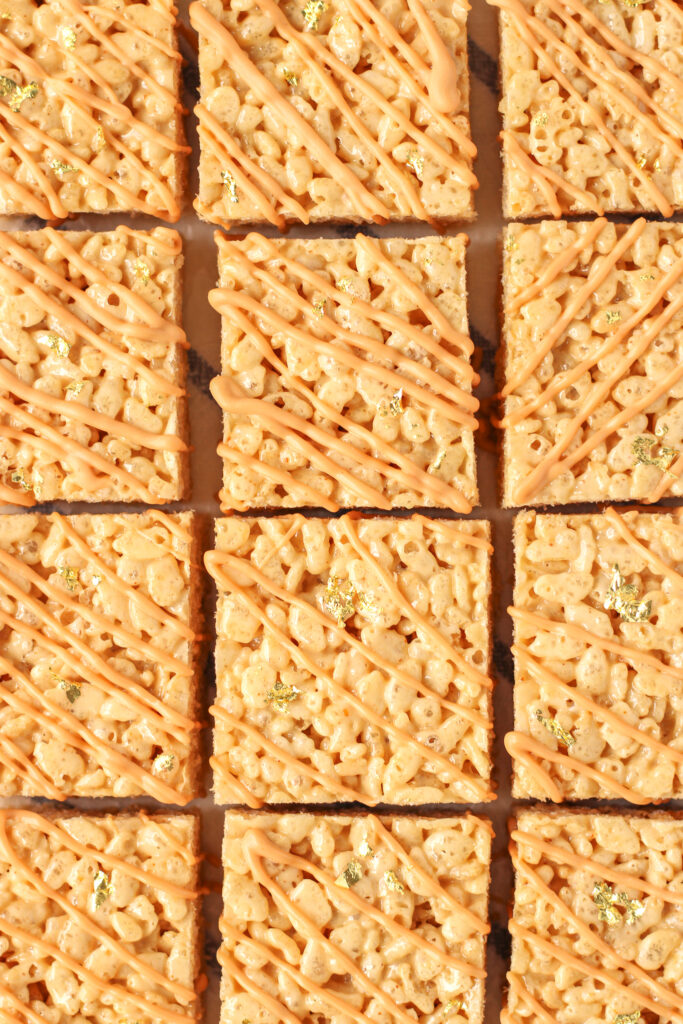 Brown Butter Caramel Rice Krispie Treats with a salted caramel drizzle and edible golden leaf