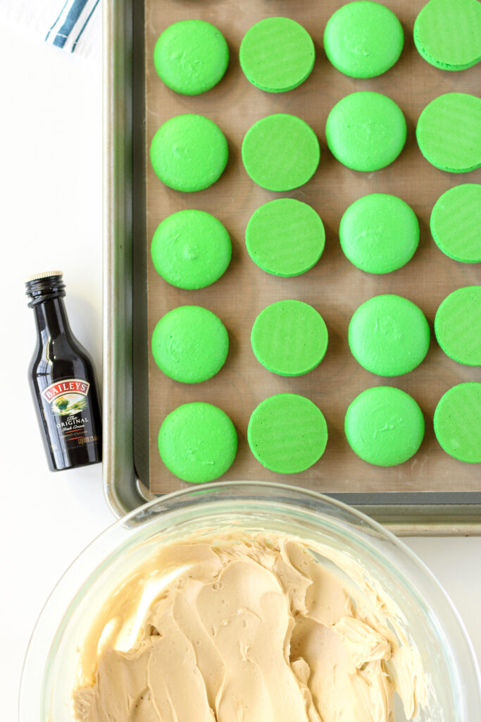 Baileys, green macaron shells, and Irish coffee buttercream