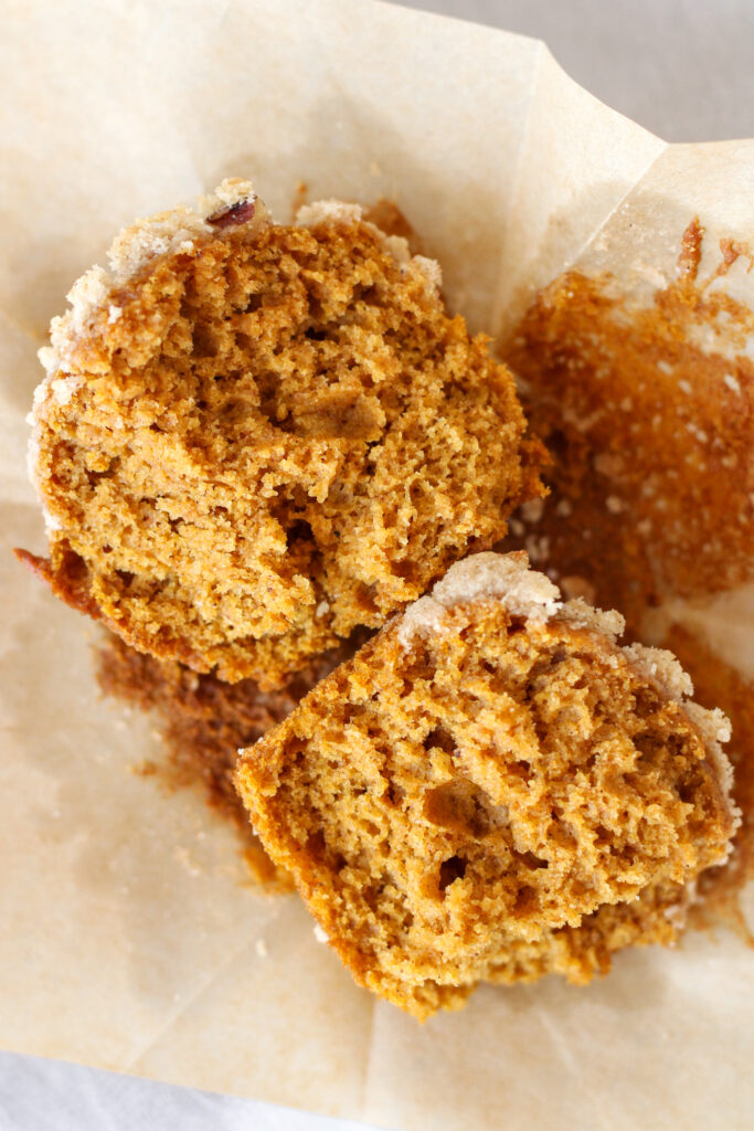 Two halves of a pumpkin muffin