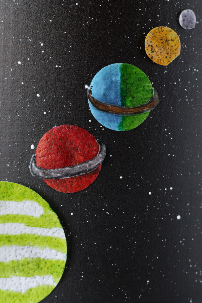 Rabou Solar System on a black cake