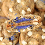 Macaron Stuffed drop cookie with funfetti chips cut in half.