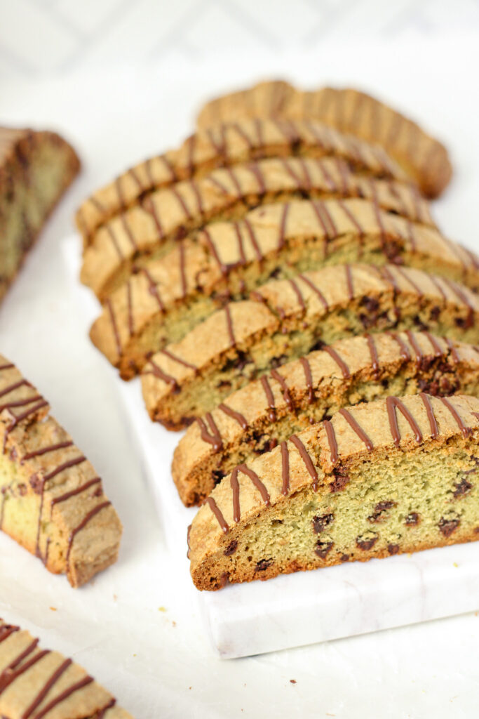 Matcha Chocolate Chip Biscotti on a marble serving board