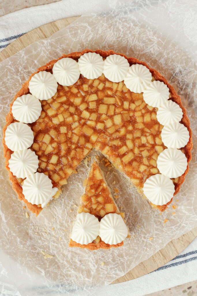 Chestnut Apple Tart with a slice just offset from the rest of the tart