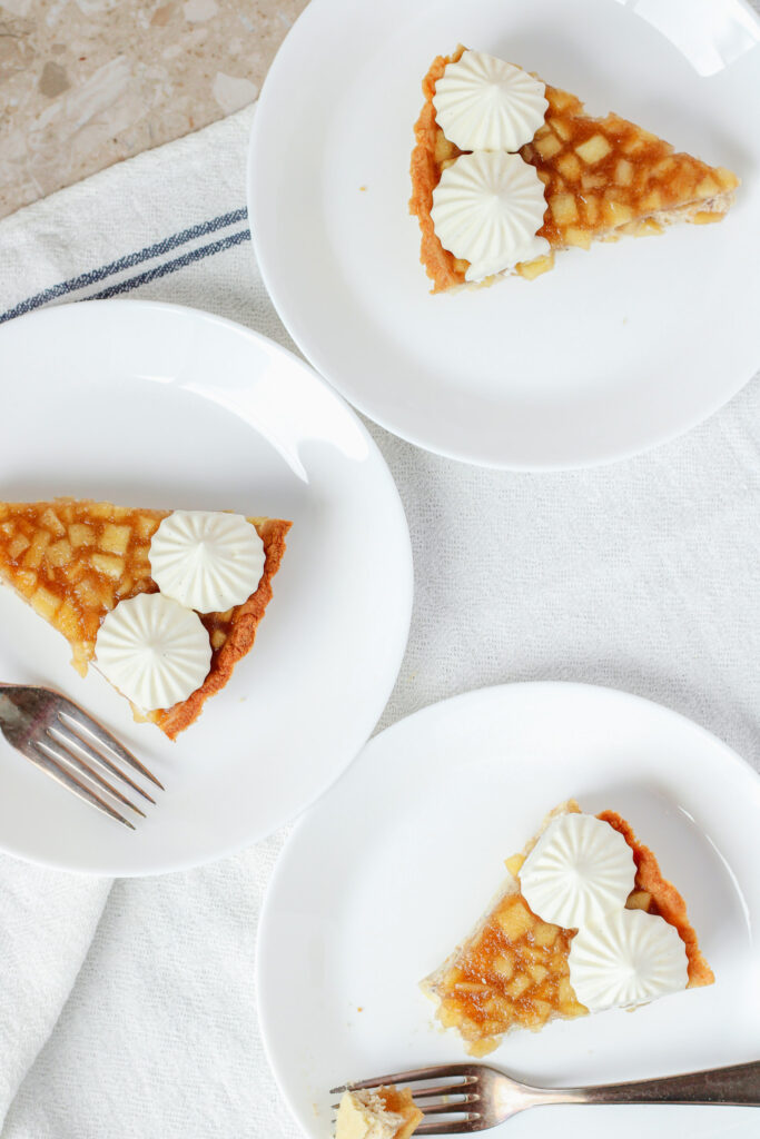Chestnut Apple Tart slices on white plates